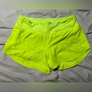 Lululemon shorts neon yellow , size 10